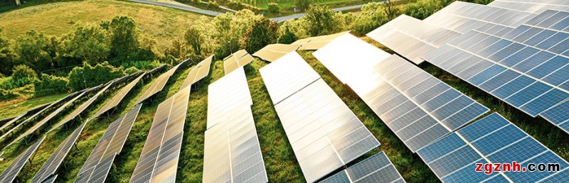 solar panel fields on green hills